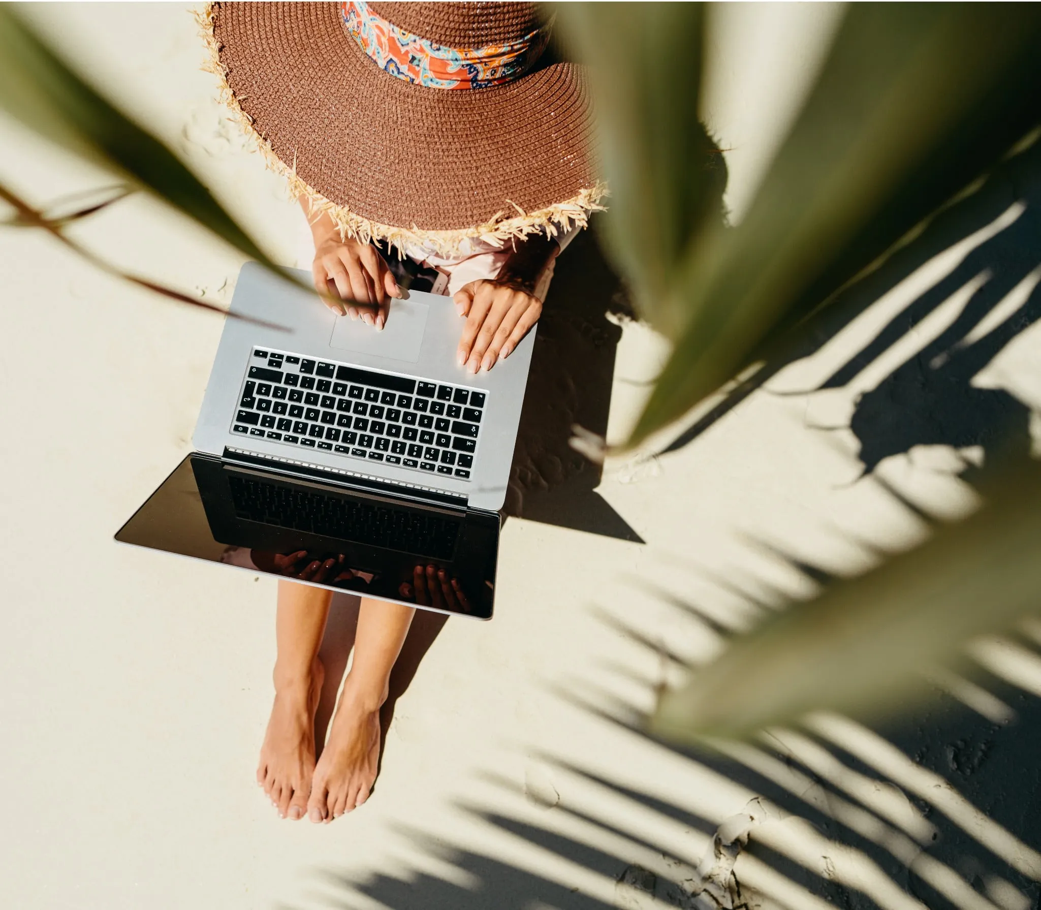 e=mc2 - a person working outside on a beach